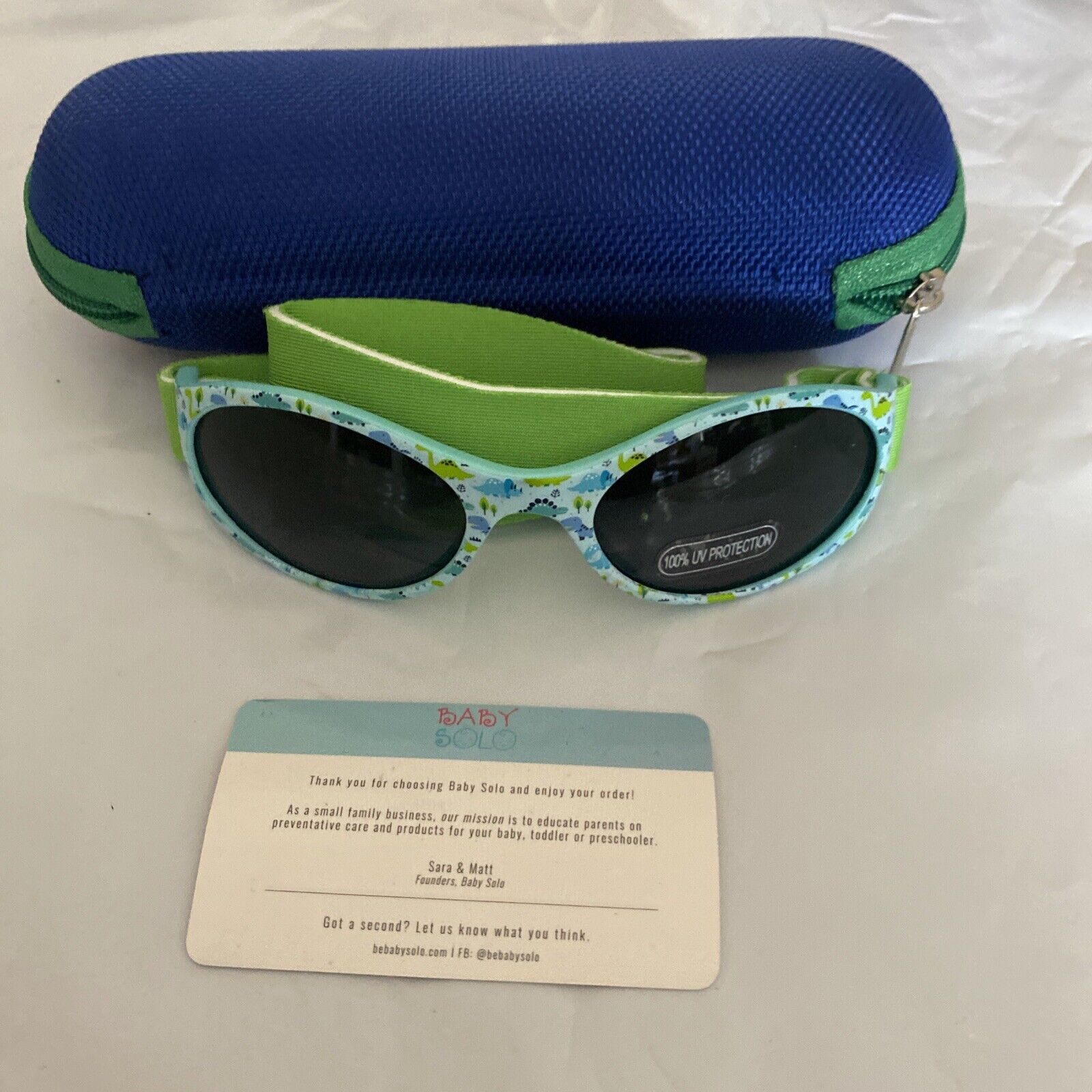 Baby Solo Sunglasses Blue Dino Frame Green Strap 0-36 Months 100% Uv Protection